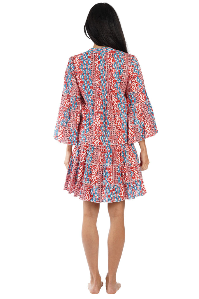 Red Multi vibrant geometric block print in red and blue on white Tiered Boho Mini Dress — back view | Caribbean boutique w...