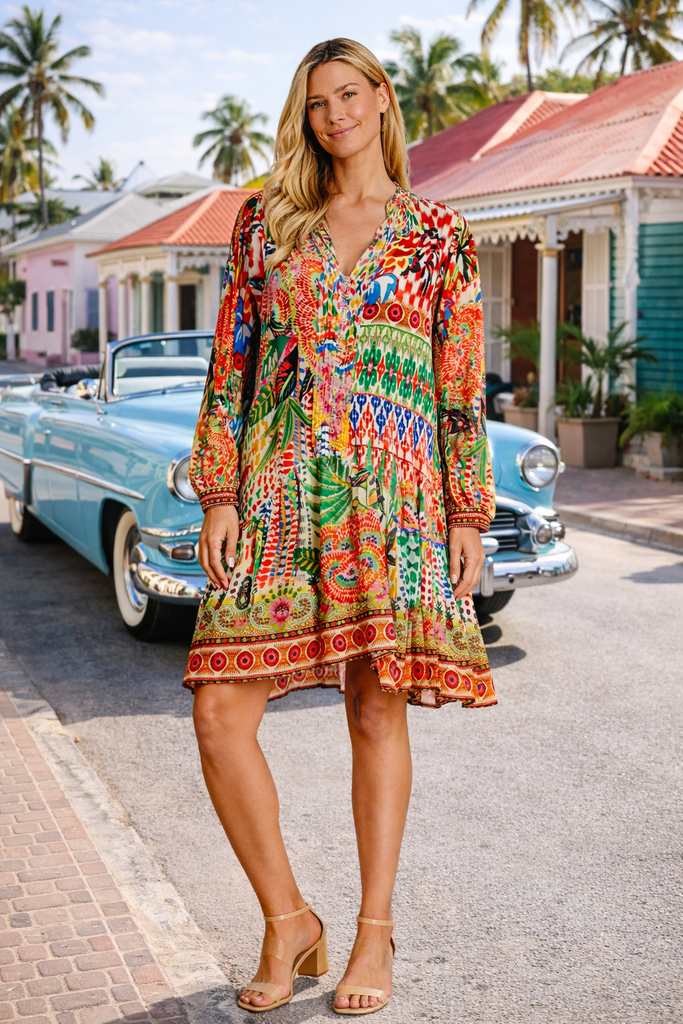 Wholesale red boho print long-sleeve V-neck mini dress with ruffled hem for resort boutiques - La Moda Clothing