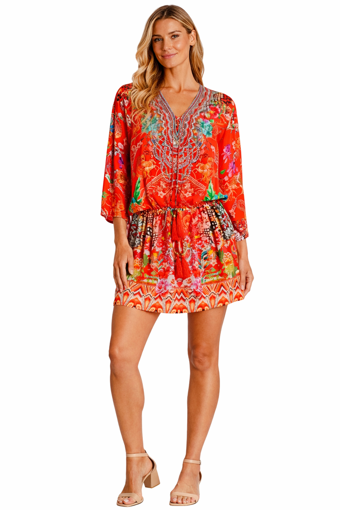 Wholesale red and orange ornamental print V-neck tunic mini dress with drawstring waist for resort boutiques - La Moda Clothing