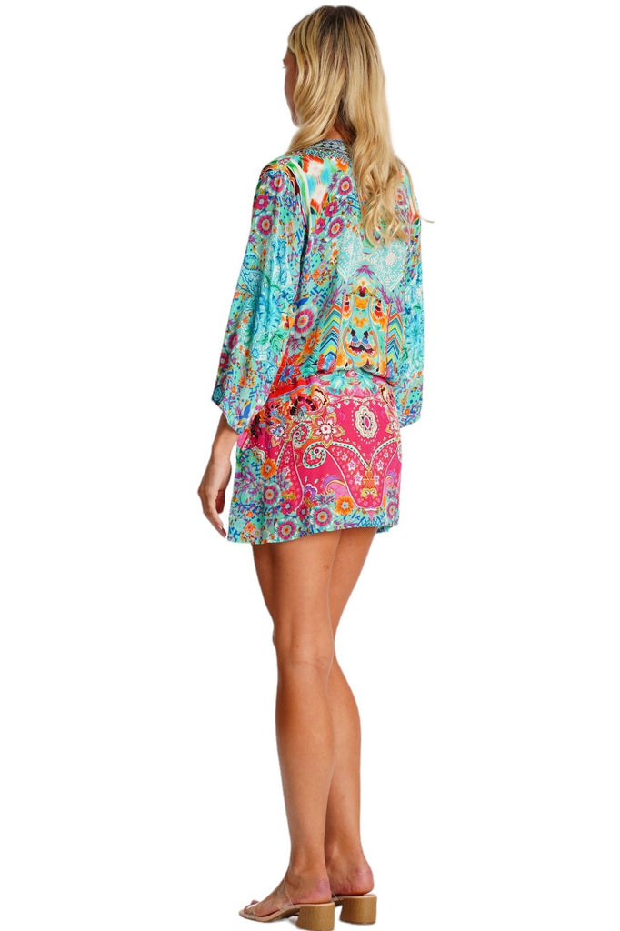 Wholesale turquoise pink and coral abstract print V-neck long-sleeve tunic mini dress with drawstring waist - La Moda Clothing