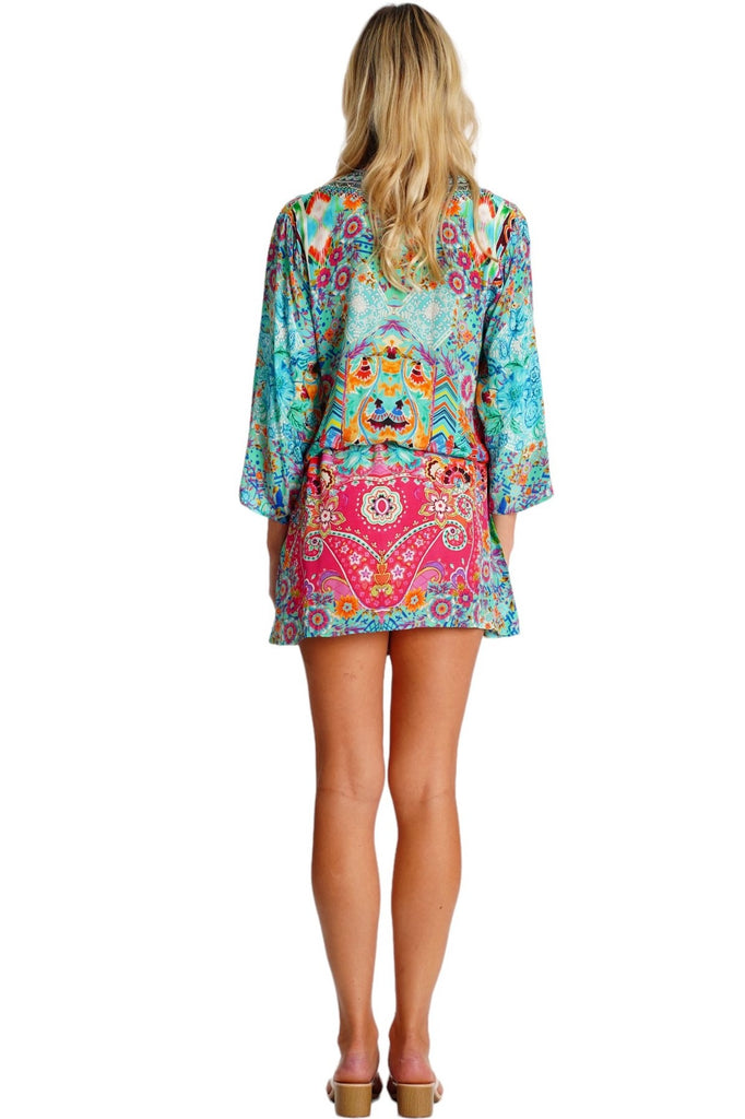 Wholesale turquoise pink and coral abstract print V-neck long-sleeve tunic mini dress with drawstring waist - La Moda Clothing
