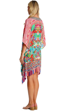 Wholesale vivid multicolor animal print kaftan cover-up side view - La Moda Clothing B2B resort wear boutique supplier SKU 25038 RK