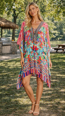 Wholesale vivid multicolor animal print kaftan cover-up outdoor lifestyle setting - La Moda Clothing B2B boutique supplier SKU 25038 RK