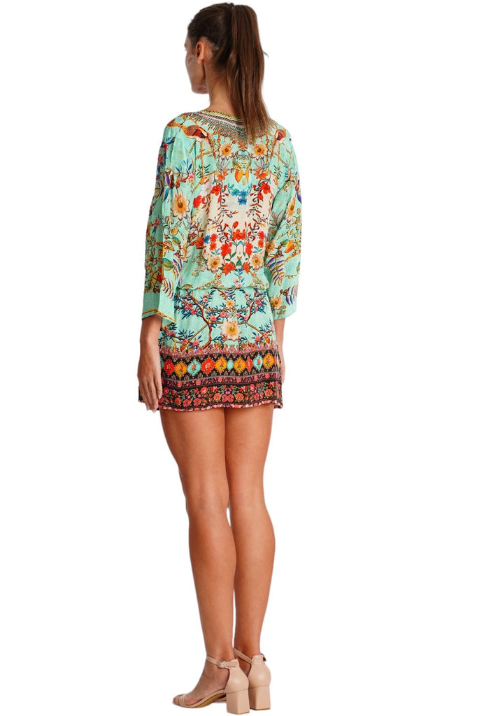Wholesale turquoise mint and coral border print V-neck tunic mini dress with 3/4 sleeves for resort boutiques - La Moda Clothing