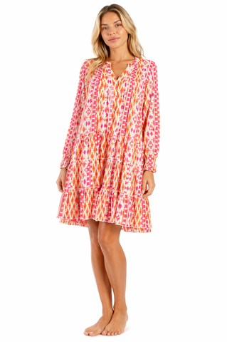 Pink zig-zag ikat / chevron tribal print in pink and orange on cr Tiered Boho Mini Dress — front view | Wholesale resort w...