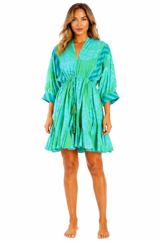 Turquoise tropical ombre tie-dye Tie-Dye Tiered Babydoll Dress — front view | Wholesale resort wear for boutiques & cruise...